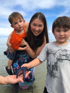 Henry and Andrew's Guide Fiji with Kids by the Ocean Playing with Starfish